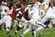 TUSCALOOSA, AL - NOVEMBER 10: Quarterback Johnny Manziel #2 ofthe Texas A&M Aggies breaks away from linebacker Adrian Hubbard #42 of the Alabaman Crimson Tide during the game at Bryant-Denny Stadium on November 10, 2012 in Tuscaloosa, Alabama. (Photo by Mike Zarrilli/Getty Images)