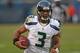 CHICAGO, IL - DECEMBER 02: Russell Wilson #3 of the Seattle Seahawks runs for a first down in overtime against the Chicago Bears at Soldier Field on December 2, 2012 in Chicago, Illinois. The Seahawks defeated the Bears 23-17 in overtime. (Photo by Jonathan Daniel/Getty Images)