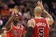 PHOENIX, AZ - NOVEMBER 14: Luol Deng #9 and Carlos Boozer #5 of the Chicago Bulls high five after scoring against the Phoenix Suns during the NBA game at US Airways Center on November 14, 2012 in Phoenix, Arizona. The Bulls defeated the Suns 112-106 in overtime. NOTE TO USER: User expressly acknowledges and agrees that, by downloading and or using this photograph, User is consenting to the terms and conditions of the Getty Images License Agreement. (Photo by Christian Petersen/Getty Images)