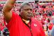 Kansas City Chiefs coach Romeo Crennel waves to the crowd after his team defeated the visiting Carolina Panthers 27-21 on Sunday.