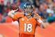 DENVER, CO - DECEMBER 2: Quarterback Peyton Manning #18 of the Denver Broncos passes the ball during a game against the Tampa Bay Buccaneers at Sports Authority Field Field at Mile High on December 2, 2012 in Denver, Colorado. (Photo by Dustin Bradford/Getty Images)