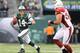 EAST RUTHERFORD, NJ - DECEMBER 02: Greg McElroy #14 of the New York Jets scrambles with the ball against the Arizona Cardinals on December 2, 2012 at MetLife Stadium in East Rutherford, New Jersey. The New York Jets defeated the Arizona Cardinals 7-6.(Photo by Elsa/Getty Images)