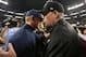 Dec 2, 2012; Arlington, TX, USA; Philadelphia Eagles head coach Andy Reid meets with Dallas Cowboys head coach Jason Garrett after the game at Cowboys Stadium. The Cowboys beat the Eagles 38-33. Mandatory Credit: Matthew Emmons-US PRESSWIRE