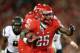 TUCSON, AZ - NOVEMBER 23: Running back Ka'Deem Carey #25 of the Arizona Wildcats rushes the football against the Arizona State Sun Devils during the college football game at Arizona Stadium on November 23, 2012 in Tucson, Arizona. The Sun Devils defeated the Wildcats 41-34. (Photo by Christian Petersen/Getty Images)