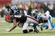 ATLANTA, GA - SEPTEMBER 30: Roddy White #84 of the Atlanta Falcons pulls in this reception against Charles Godfrey #30 and Josh Norman #24 of the Carolina Panthers at Georgia Dome on September 30, 2012 in Atlanta, Georgia. (Photo by Kevin C. Cox/Getty Images)