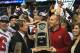DETROIT, MI - NOVEMBER 30: Head coach Dave Doeren of the Northern Illinois Huskies is presented the championship trophy by MAC Commissioner, Dr. Jon A. Steinbrecher after defeating the Kent State Golden Flashes 44-37 during the Mid-American Conference Championship game at Ford Field on November 30, 2012 in Detroit, Michigan. (Photo by Dave Reginek/Getty Images)