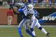 DETROIT, MI - DECEMBER 02: Calvin Johnson #81 of the Detroit Lions catches the ball in front of Vontae Davis #23 of the Indianapolis Colts at Ford Field on December 2, 2012 in Detroit, Michigan. (Photo by Dave Reginek/Getty Images)