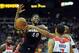 Oct 24, 2012; Kansas City, MO, USA; Miami Heat forward Udonis Haslem (40) is stopped by Washington Wizards forward Brian Cook (43) and guard Jannero Pargo (7) in the fourth quarter at the Sprint Center. Washington won the game 101-94. Mandatory Credit: John Rieger-USA TODAY Sports