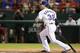 ARLINGTON, TX - SEPTEMBER 12: Josh Hamilton #32 of the Texas Rangers hits a solo homerun against the Cleveland Indians at Rangers Ballpark in Arlington on September 12, 2012 in Arlington, Texas. (Photo by Ronald Martinez/Getty Images)