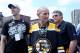 BOSTON, MA - JUNE 18: (L-R) Zdeno Chara, Jeremy Jacobs, and Cam Neely, of the Boston Bruins react to cheers during the Stanley Cup victory parade on June 18, 2011 in Boston, Massachusetts. (Photo by Jim Rogash/Getty Images)