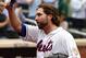 NEW YORK, NY - SEPTEMBER 27: R.A. Dickey #43 of the New York Mets acknowledges the crowd after being pulled in the eighth inning against the Pittsburgh Pirates at Citi Field on September 27, 2012 in the Flushing neighborhood of the Queens borough of New York City. (Photo by Alex Trautwig/Getty Images)