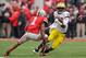 COLUMBUS, OH - NOVEMBER 24: Quarterback Denard Robinson #16 of the Michigan Wolverines runs with the ball against the Ohio State Buckeyes at Ohio Stadium on November 24, 2012 in Columbus, Ohio. (Photo by Jamie Sabau/Getty Images)