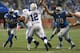 DETROIT, MI - DECEMBER 02: Andrew Luck #12 of the Indianapolis Colts gets pressure from Ndamukong Suh #90 and Nick Fairley #98 of the Detroit Lions at Ford Field on December 2, 2012 in Detroit, Michigan. The Colts won 35-33 (Photo by Dave Reginek/Getty Images)
