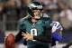 ARLINGTON, TX - DECEMBER 02: Quarterback Nick Foles #9 of the Philadelphia Eagles looks for an open receiver under pressure from outside linebacker DeMarcus Ware #94 of the Dallas Cowboys at Cowboys Stadium on December 2, 2012 in Arlington, Texas. (Photo by Tom Pennington/Getty Images)