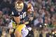 Nov. 17, 2012; South Bend, IN, USA; Notre Dame Fighting Irish tight end Tyler Eifert (80) catches a pass as Wake Forest Demon Deacons linebacker Mike Olson (41) defends in the third quarter at Notre Dame Stadium. Eifert set a record for most catches by a Notre Dame tight end on the play. Notre Dame won 38-0. Mandatory Credit: Matt Cashore-USA TODAY Sports