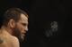 SYDNEY, AUSTRALIA - FEBRUARY 27: Jon Fitch of the USA looks across the octagon at BJ Penn of the USA before the start of their welterweight bout part of UFC 127 at Acer Arena on February 27, 2011 in Sydney, Australia. (Photo by Mark Kolbe/Getty Images)