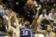 Dec 1, 2012; San Antonio, TX, USA; Memphis Grizzlies forward Zach Randolph (50) reaches for a rebound against San Antonio Spurs forward Matt Bonner (15) and Tim Duncan (21) during the second half at the AT&T Center. The Spurs won 99-95. Mandatory Credit: Soobum Im-USA TODAY Sports