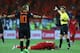 KHARKOV, UKRAINE - JUNE 17: Wesley Sneijder (L) of Netherlands reacts as referee Nicola Rizzoli signals for a foul on Pepe of Portugal during the UEFA EURO 2012 group B match between Portugal and Netherlands at Metalist Stadium on June 17, 2012 in Kharkov, Ukraine. (Photo by Julian Finney/Getty Images)