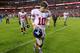 LANDOVER, MD - DECEMBER 03: Quarterback Eli Manning #10 of the New York Giants jogs off the field after losing 17-16 to the Washington Redskins at FedExField on December 3, 2012 in Landover, Maryland. (Photo by Rob Carr/Getty Images)