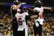 Nov 30, 2012; Detroit, MI, USA; Northern Illinois Huskies quarterback Jordan Lynch (6) celebrates with tight end Luke Eakes (83) and wide receiver Tommylee Lewis (10) after rushing for a touchdown in the fourth quarter of the 2012 MAC Championship at Ford Field. Mandatory Credit: Andrew Weber-USA TODAY Sports