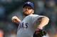 SEATTLE, WA - SEPTEMBER 23: Starting pitcher Ryan Dempster #46 of the Texas Rangers pitches against the Seattle Mariners at Safeco Field on September 23, 2012 in Seattle, Washington. (Photo by Otto Greule Jr/Getty Images)
