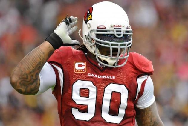 Dockett Spat in Rhodes' Face