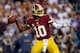 LANDOVER, MD - DECEMBER 03: Quarterback Robert Griffin III #10 of the Washington Redskins throws the ball in the first quarter while taking on the New York Giants at FedExField on December 3, 2012 in Landover, Maryland. (Photo by Rob Carr/Getty Images)