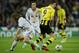 MADRID, SPAIN - NOVEMBER 06: Robert Lewandowski (R) of Borussia Dortmund controls the ball besides Luka Modric of Real Madrid during the UEFA Champions League group D match between Real Madrid and Borussia Dortmund at Estadio Santiago Bernabeu on November 6, 2012 in Madrid, Spain. (Photo by Jasper Juinen/Getty Images)