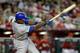 PHOENIX, AZ - SEPTEMBER 30: Alfonso Soriano #12 of the Chicago Cubs lines a single to the outfield against the Arizona Diamondbacks during the sixth inning of a MLB game at Chase Field on September 30, 2012 in Phoenix, Arizona. (Photo by Ralph Freso/Getty Images)