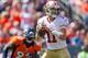 DENVER, CO - AUGUST 26: Quarterback Alex Smith #11 of the San Francisco 49ers in action during a pre-season game against the Denver Broncos at Sports Authority Field Field at Mile High on August 26, 2012 in Denver, Colorado. (Photo by Justin Edmonds/Getty Images)
