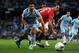 MANCHESTER, ENGLAND - APRIL 30: Rio Ferdinand of Manchester United tangles with Sergio Aguero of Manchester City during the Barclays Premier League match between Manchester City and Manchester United at the Etihad Stadium on April 30, 2012 in Manchester, England. (Photo by Michael Regan/Getty Images)