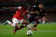 LONDON, ENGLAND - OCTOBER 03: Gervinho of Arsenal crosses the ball as Pablo Contreras of Olympiacos closes in during the UEFA Champions League Group B match between Arsenal FC and Olympiacos FC at Emirates Stadium on October 03, 2012 in London, England. (Photo by Mike Hewitt/Getty Images)