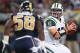 ST. LOUIS, MO - NOVEMBER 18: Tim Tebow #15 of the New York Jets looks to pass the ball against the St. Louis Rams at the Edward Jones Dome on November 18, 2012 in St. Louis, Missouri. (Photo by Dilip Vishwanat/Getty Images)