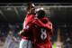 READING, ENGLAND - DECEMBER 01: Anderson of Manchester United celebrates scoring with teammate Robin van Persie during the Barclays Premier League match between Reading and Manchester United at Madejski Stadium on December 1, 2012 in Reading, England. (Photo by Michael Regan/Getty Images)