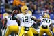 EAST RUTHERFORD, NJ - NOVEMBER 25: Quarterback Aaron Rodgers #12 of the Green Bay Packers drops back to pass against the New York Giants at MetLife Stadium on November 25, 2012 in East Rutherford, New Jersey. (Photo by Al Bello/Getty Images)