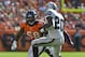 September 30 2012; Denver, CO, USA; Denver Broncos outside linebacker Von Miller (58) chases down Oakland Raiders running back Darren McFadden (20) during second quarter of the game at Sports Authority Field. Mandatory Credit: Ron Chenoy-USA TODAY Sports