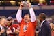 INDIANAPOLIS, IN - DECEMBER 01: Wisconsin Badgers head coach Bret Bielema celebrates the Big Ten Championship holding the Amos Alonzo Stagg Championship Trophy after defeating the Nebraska Cornhuskers 70-31 at Lucas Oil Stadium on December 1, 2012 in Indianapolis, Indiana. (Photo by Leon Halip/Getty Images)