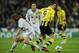 MADRID, SPAIN - NOVEMBER 06: Robert Lewandowski (R) of Borussia Dortmund controls the ball besides Luka Modric of Real Madrid during the UEFA Champions League group D match between Real Madrid and Borussia Dortmund at Estadio Santiago Bernabeu on November 6, 2012 in Madrid, Spain. (Photo by Jasper Juinen/Getty Images)