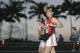 HONOLULU - DECEMBER 11: With Waikiki Beach in the background, Junko Moriyuki, of Kitakyuusyuu-Shi Japan, participates in the 2005 Honolulu Marathon on December 11, 2005 in Honolulu, Hawaii. (Photo by Marco Garcia/Getty Images)