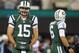 EAST RUTHERFORD, NJ - NOVEMBER 22: Quarterbacks Tim Tebow #15 and Mark Sanchez #6 of the New York Jets before the start of their game against the New England Patriots at MetLife Stadium on November 22, 2012 in East Rutherford, New Jersey. (Photo by Rich Schultz /Getty Images)
