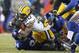 Nov 25, 2012; East Rutherford, NJ, USA; New York Giants outside linebacker Mathias Kiwanuka (94) and outside linebacker Michael Boley (59) bring down Green Bay Packers running back Alex Green (20) during the first half at MetLife Stadium. Mandatory Credit: Jim O'Connor-USA TODAY Sports