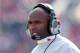 LOUISVILLE, KY - NOVEMBER 24: Charlie Strong the head coach of the Louisville Cardinals gives instructions to his team during the game against the Connecticut Huskies at Papa John's Cardinal Stadium on November 24, 2012 in Louisville, Kentucky. (Photo by Andy Lyons/Getty Images)