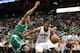 ATLANTA, GA - MAY 08: Forward Al Horford #15 of the Atlanta Hawks dribbles around center Ryan Hollins #50 of the Boston Celtics during Game Five of the Eastern Conference Quarterfinals of the NBA Playoffs at Philips Arena on May 8, 2012 in Atlanta, Georgia. NOTE TO USER: User expressly acknowledges and agrees that, by downloading and or using this photograph, User is consenting to the terms and conditions of the Getty Images License Agreement. (Photo by Mike Zarrilli/Getty Images)