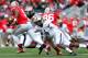 COLUMBUS, OH - OCTOBER 20: Taylor Richards #4 of the Purdue Boilermakers sacks Braxton Miller #5 of the Ohio State Buckeyes on October 20, 2012 at Ohio Stadium in Columbus, Ohio. (Photo by Kirk Irwin/Getty Images)