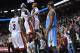Nov. 3, 2012; Miami, FL, USA; Miami Heat small forward LeBron James (6) chest bumps teammate shooting guard Ray Allen (34) as Allen made a three point basket during the second half at American Airlines Arena. Miami Heat shooting guard Dwyane Wade (left) and Denver Nuggets small forward Corey Brewer (right) both look on. The Heat won 119-116. Mandatory Credit: Steve Mitchell-USA TODAY Sports