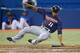 TORONTO, CANADA - OCTOBER 1: Ben Revere #11 of the Minnesota Twins slides and scores a run in the seventh inning during MLB game action against the Toronto Blue Jays on October 1, 2012 at Rogers Centre in Toronto, Ontario, Canada. (Photo by Tom Szczerbowski/Getty Images)
