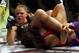 March 3, 2012; Columbus, OH, USA; Ronda Rousey punches Miesha Tate during the Strikeforce Grand Prix final at Nationwide Arena. Mandatory Credit: Greg Bartram-USA TODAY Sports
