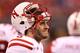 INDIANAPOLIS, IN - DECEMBER 01: Taylor Martinez #3 of the Nebraska Cornhuskers wacthes the action on the sidelines during the third quarter of the Big Ten Championship game against the Wisconsin Badgers at Lucas Oil Stadium on December 1, 2012 in Indianapolis, Indiana. (Photo by Leon Halip/Getty Images)