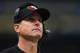 ST. LOUIS, MO - DECEMBER 2: Head coach Jim Harbaugh of the San Francisco 49ers looks on from the sideline against the St. Louis Rams at the Edward Jones Dome on December 2, 2012 in St. Louis, Missouri. The Rams beat the 49ers 16-13 in overtime. (Photo by Dilip Vishwanat/Getty Images)