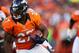 December 2, 2012; Denver, CO, USA; Denver Broncos running back Knowshon Moreno (27) runs with the ball during the first quarter against the Tampa Bay Buccaneers at Sports Authority Field at Mile High. Mandatory Credit: Chris Humphreys-USA TODAY Sports